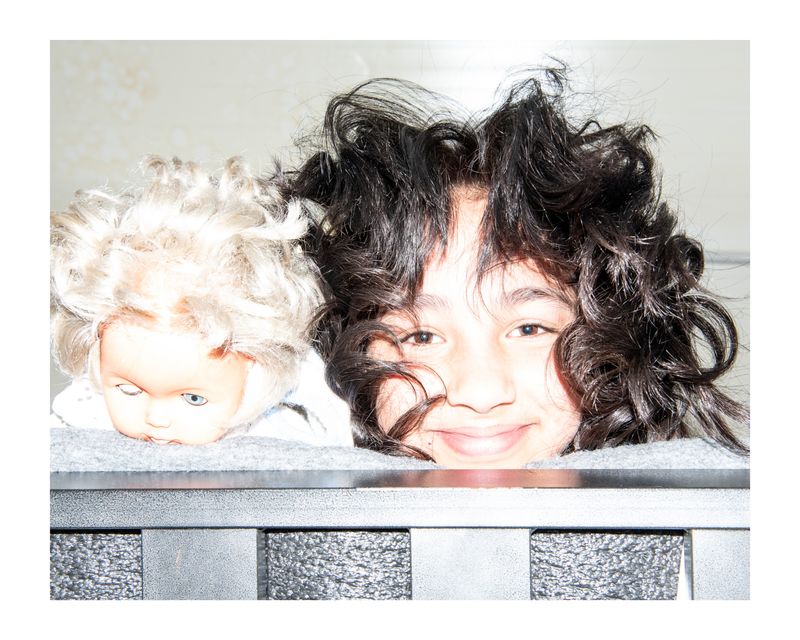 © Charlotte Schmitz - Soman (10) with her doll