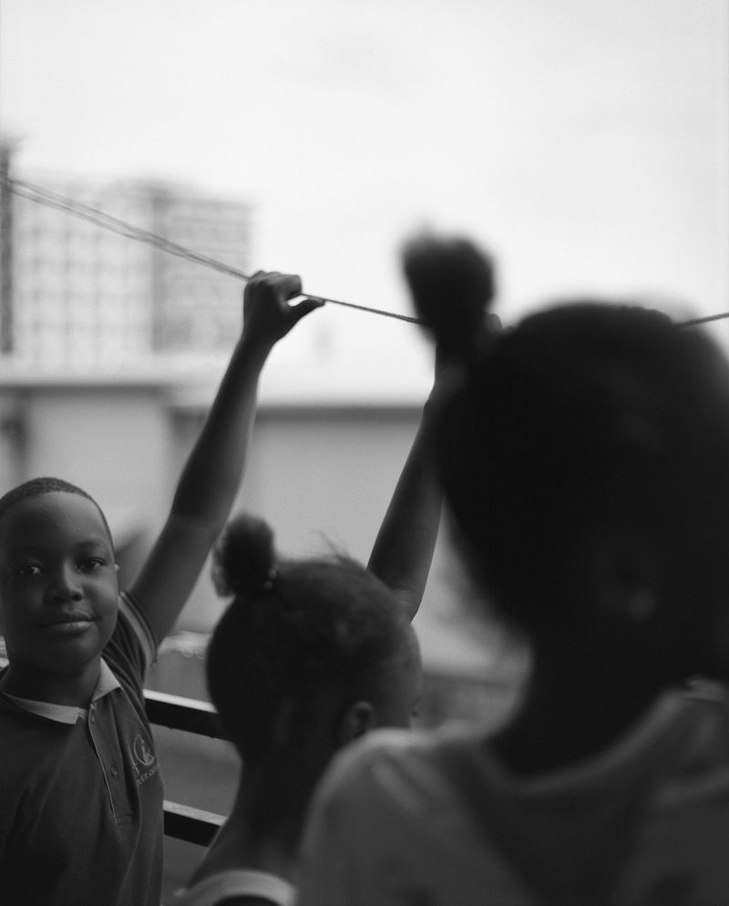 © Chrystel Mukeba - For me, it is a symbolic image because I see my father at the same age, alone on a plane, leaving everything behind.