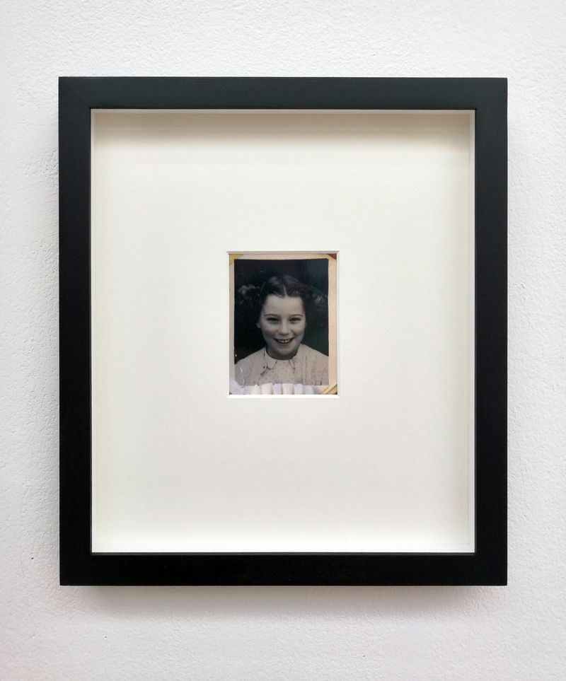© Jonny Briggs - Dummy - my teeth underbiting a photograph of my Mother, 2018