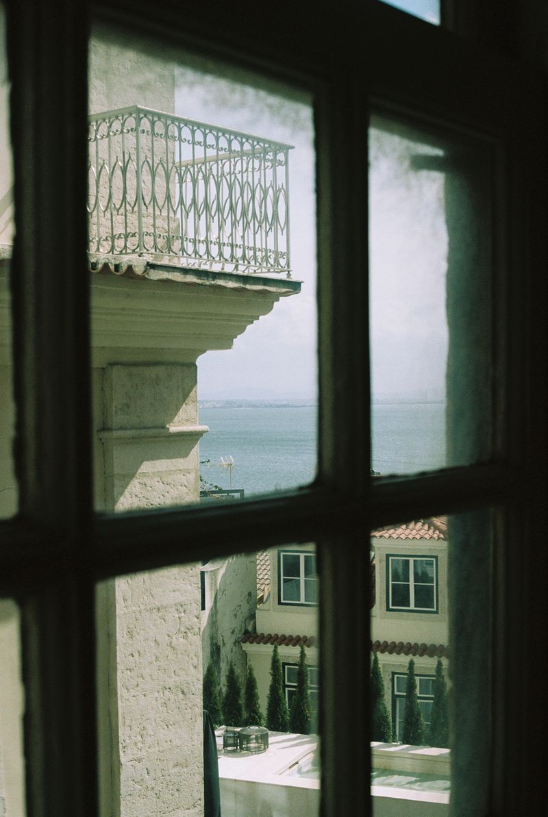 © Liesl Pfeffer - Lisbon (window)Portugal202435mm photograph