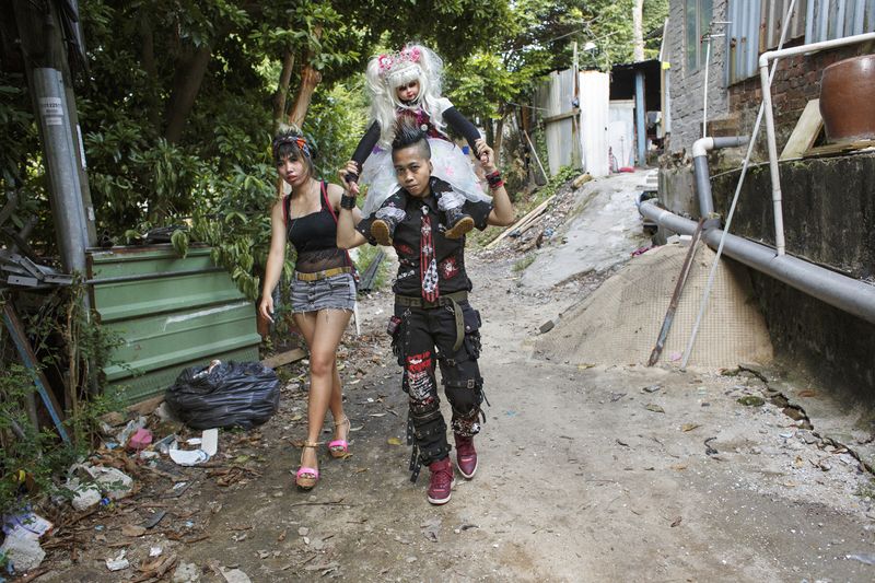 © Rebecca Sampson - Missing family life, substituting children with dolls - Indonesian housemaids on their day off, Hong Kong