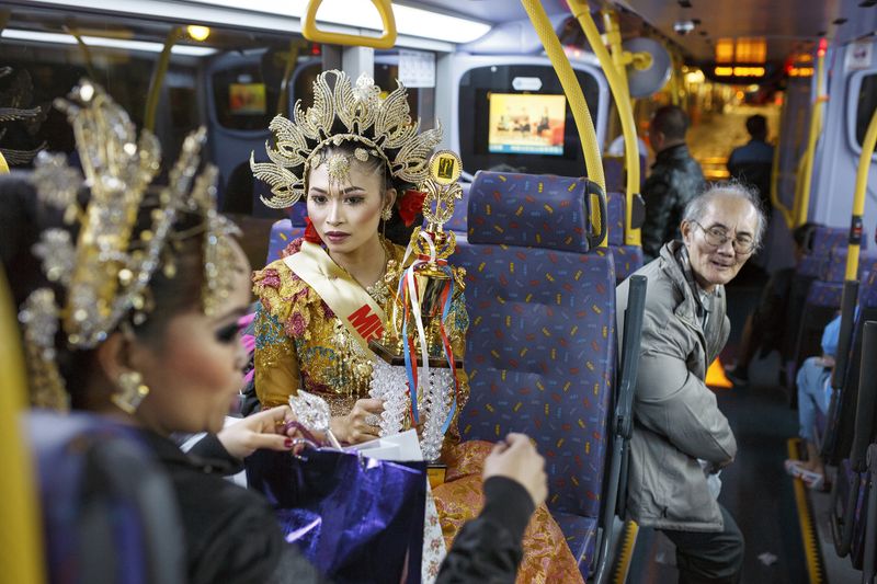 © Rebecca Sampson - Housemaid - Beauty queen contestants on their way home on Sunday evening