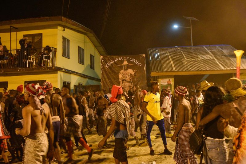 © Chukwuka Obu - 14. Indigenes still active in front of the sign board after activities