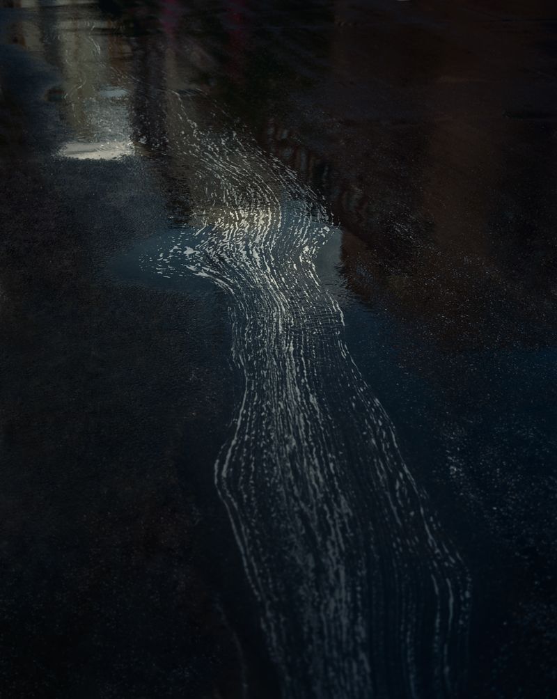 © Tianxi Wang - Foam on the street after rain. 2021