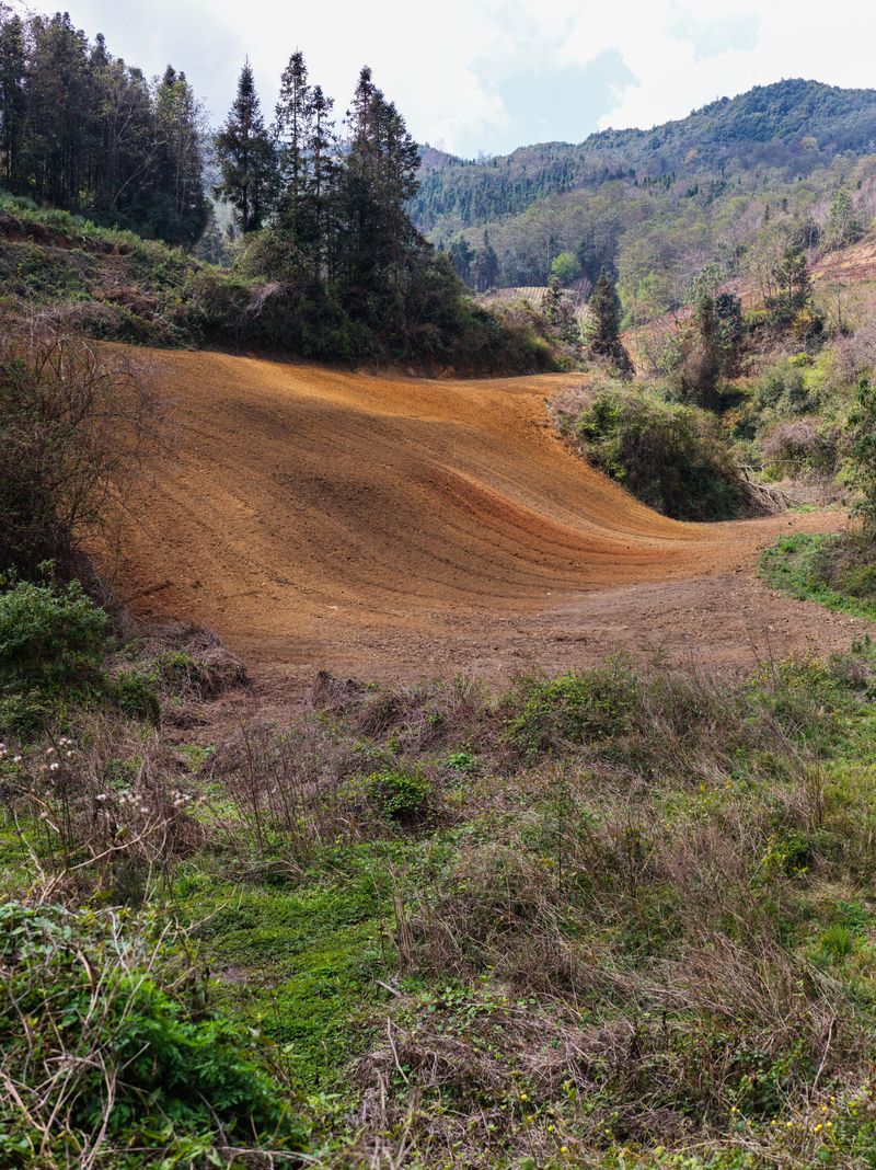 © Tianxi Wang - Red earth awaiting planting.