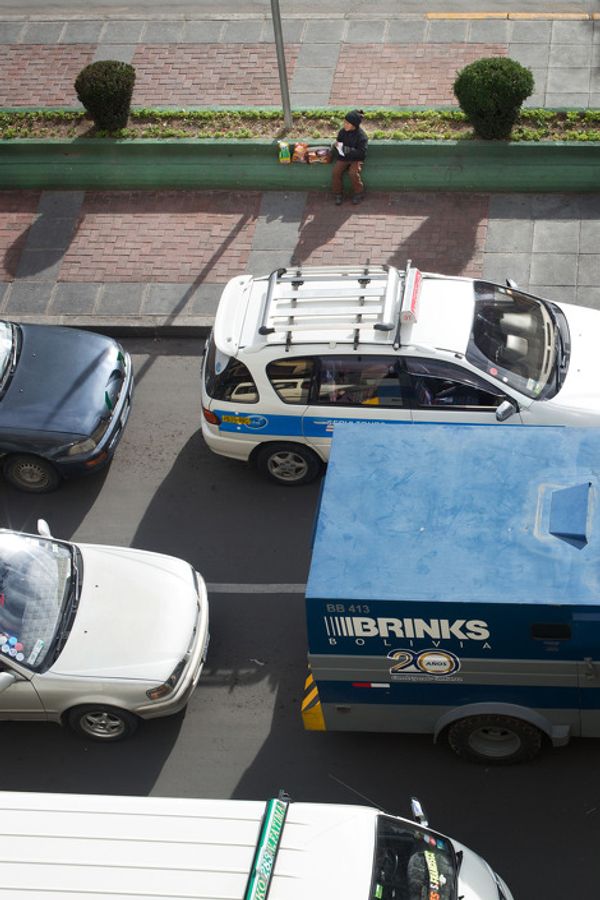 © Toby Binder - Antony (5) is one of the youngest. He is selling sweets to cars passing by.