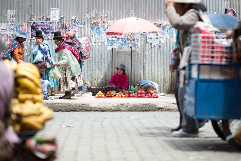 © Toby Binder - Little girl selling fruits on a main street in El Alto.