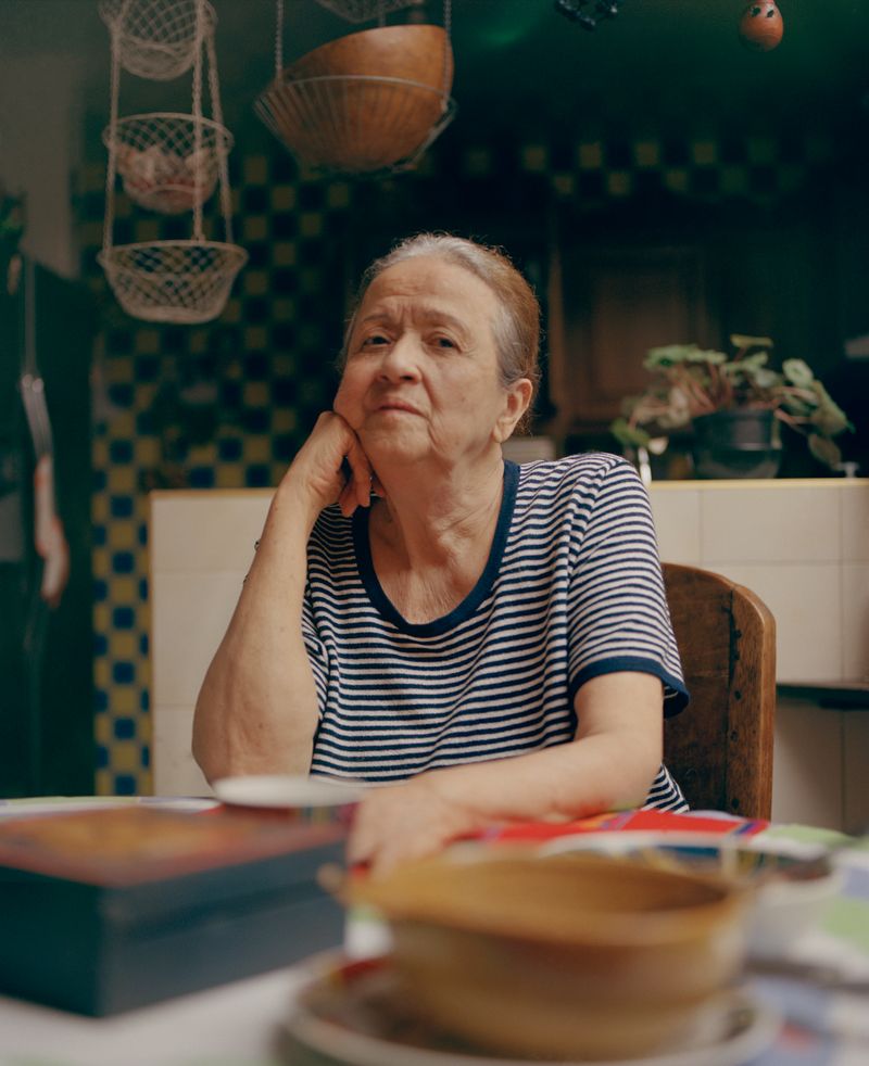© Mateo Arciniegas Huertas - My aunt Betsy looks at me after we had lunch at her home.