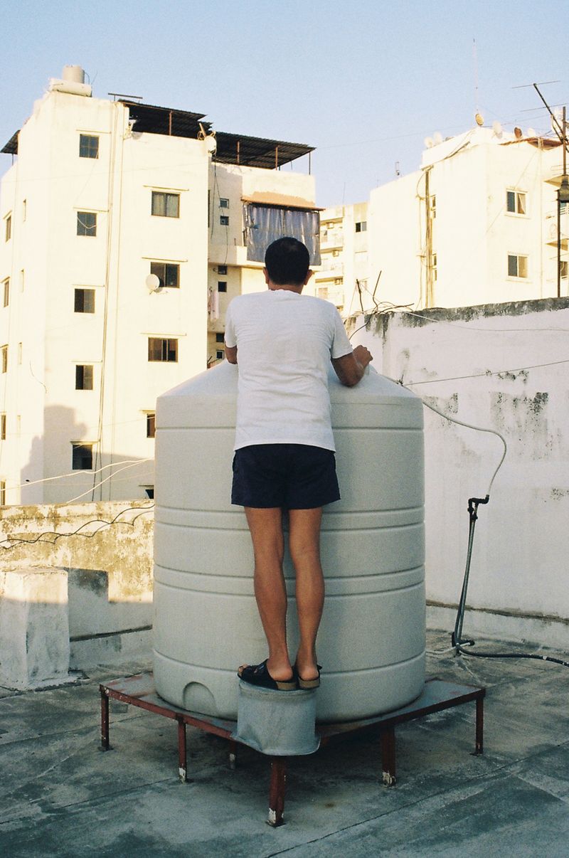 © Aya Zahra - Baba at the roof of my family home, Abou Samra, Tripoli, Lebanon