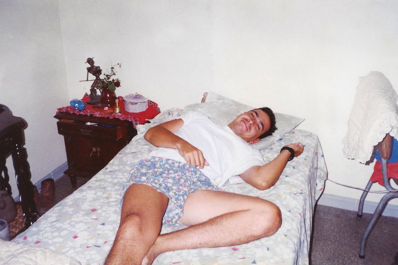 © María Fernanda Pérez - A portrait of my father lying on my mom's bed, back when they were dating.