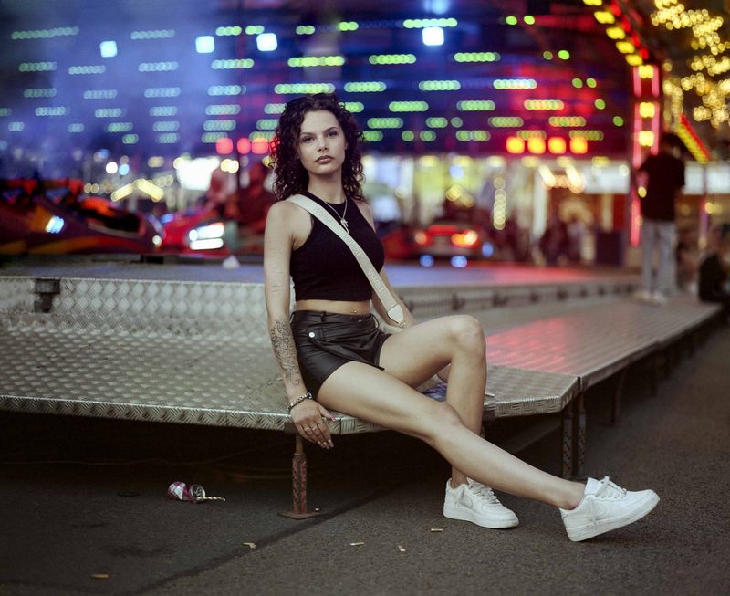 © Nina Schollaardt - Tessi (16) at the fun fair in Tilburg, July 2024