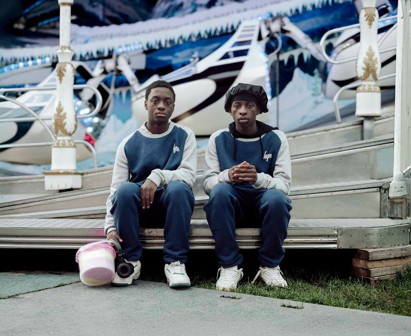 © Nina Schollaardt - Keith (14) and Atipa (15) at the fun fair in The Hague, April 2024