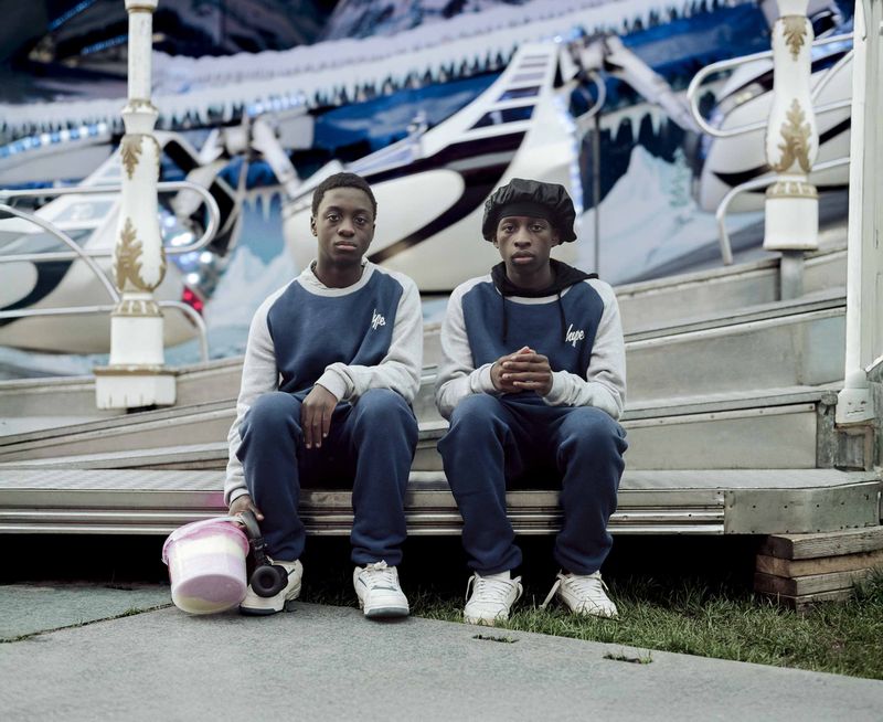 © Nina Schollaardt - Keith (14) and Atipa (15) at the fun fair in The Hague, April 2024
