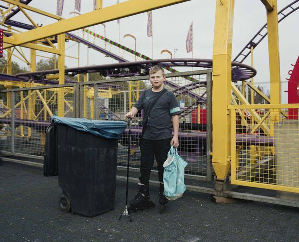 © Nina Schollaardt - Jessie (11) at the fun fair in Rotterdam, November 2024