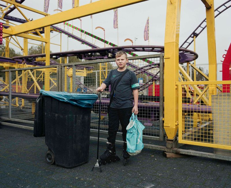© Nina Schollaardt - Jessie (11) at the fun fair in Rotterdam, November 2024