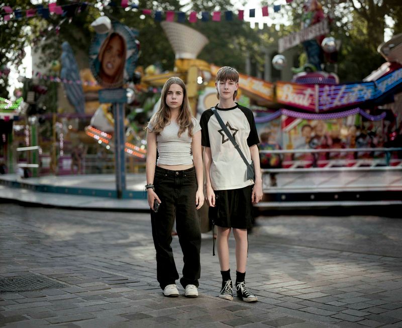 © Nina Schollaardt - Fleur (14) and Wessel (15) at the fun fair in Tilburg, July 2024