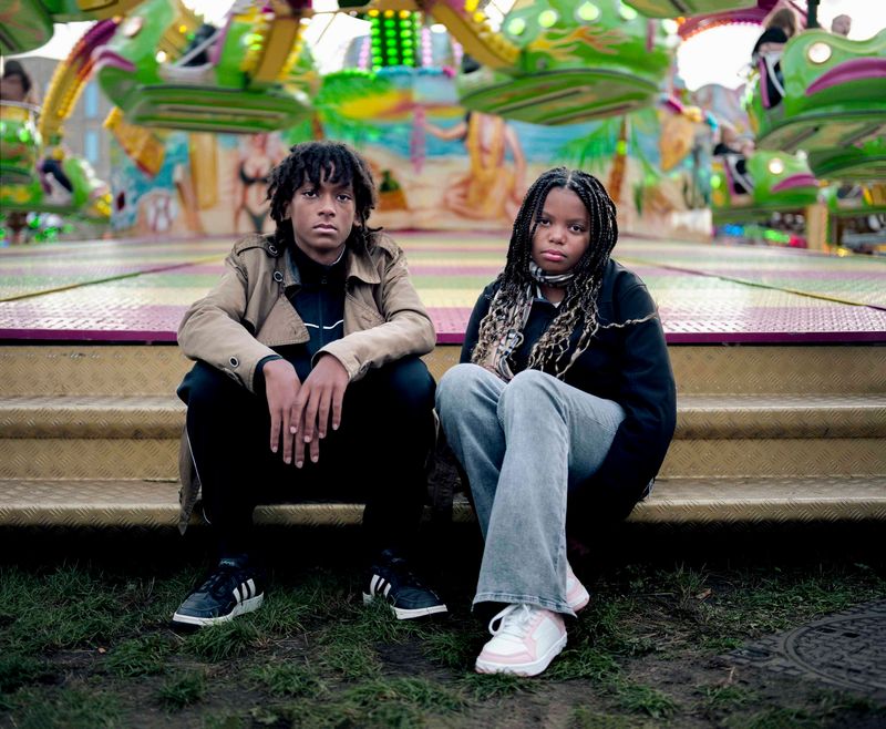 © Nina Schollaardt - Scott (13) and Sofia (12) at the fun fair in Leiden, October 2023