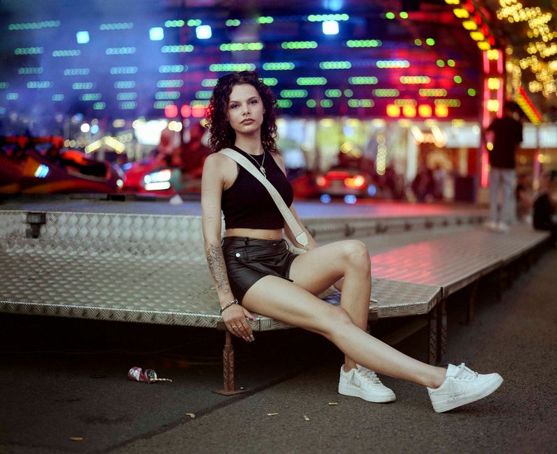 © Nina Schollaardt - Tessi (16) at the fun fair in Tilburg, July 2024