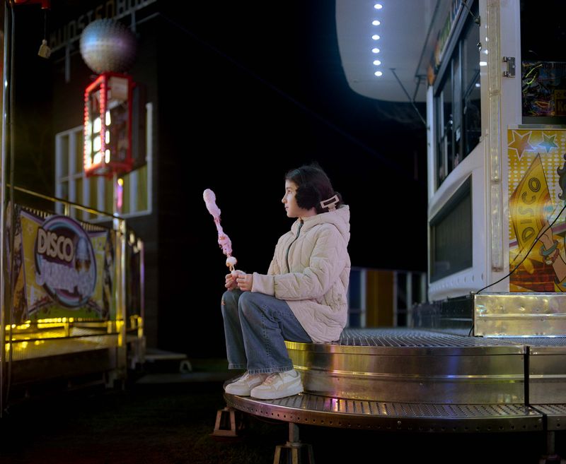 © Nina Schollaardt - Leila (10) at the Fun Fair in Westerpark, Amsterdam, The Netherlands