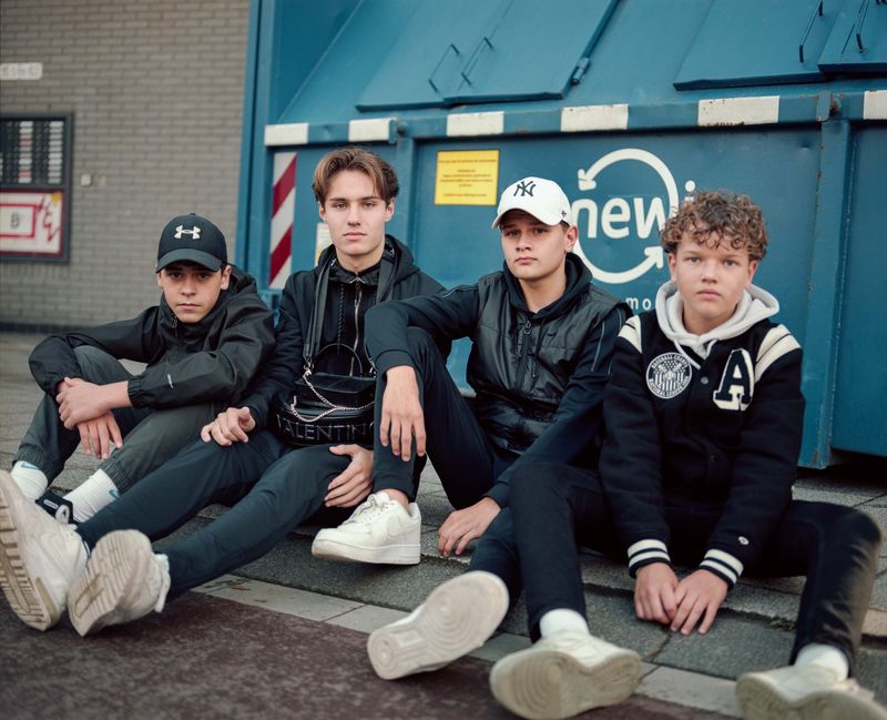 © Nina Schollaardt - Friend group Mo (14), Roland (15), Miles (14) and Lars (14) at the Fun Fair in Leiden, The Netherlands