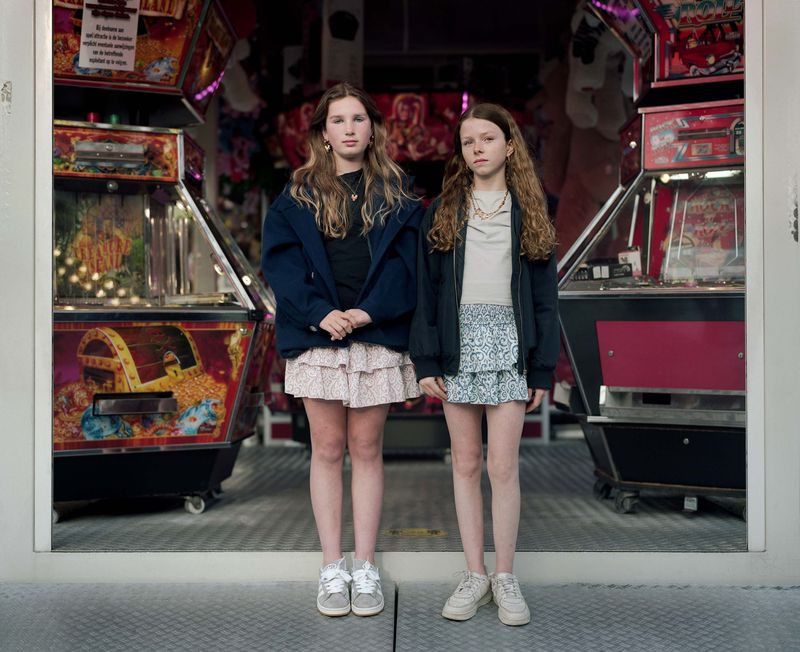 © Nina Schollaardt - Friends Keet (12) and Guusje (14) at the Fun Fair in Oegstgeest, The Netherlands