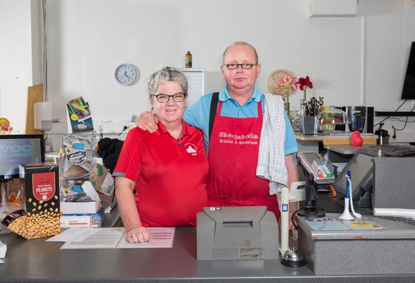 © Sigridur Rut Marrow - Corner Couple. A store called "Skerjakolla" in the north-east part of Iceland, Kópasker.