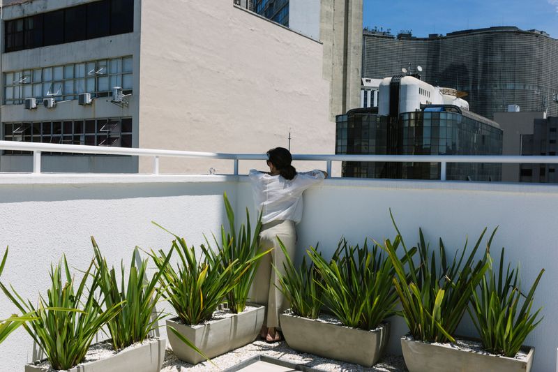 © Gabriel Carpes - My mother looks at the city from the apartment building my sister lives in.
