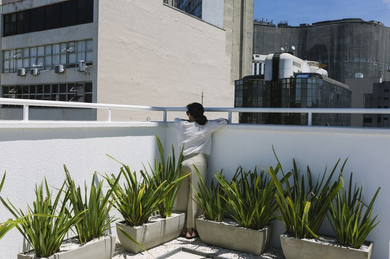 © Gabriel Carpes - My mother looks at the city from the apartment building my sister lives in.
