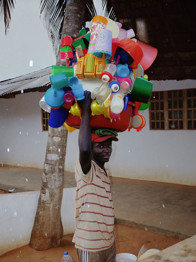 © yingying gao - August 2023, Dar es Salaam. A man selling daily necessities.