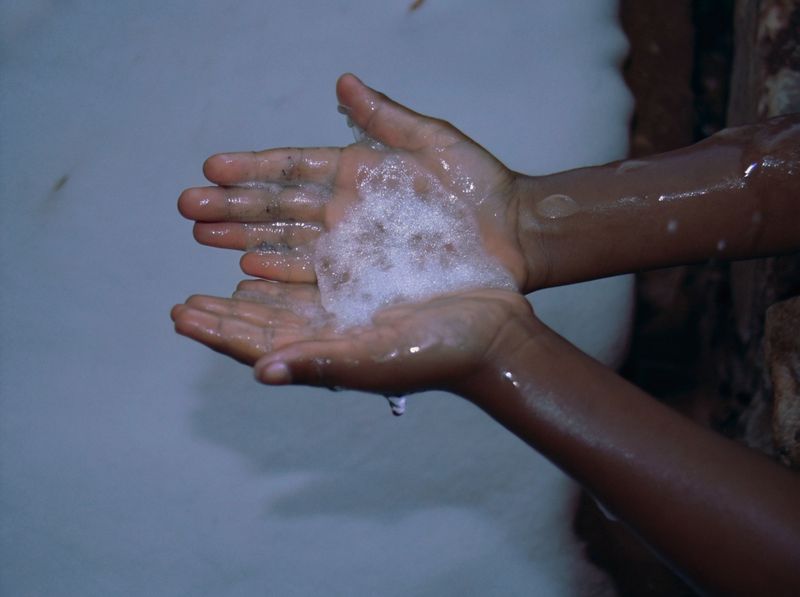 © yingying gao - August 2023, Dar es Salaam. A child touching snow for the first time.