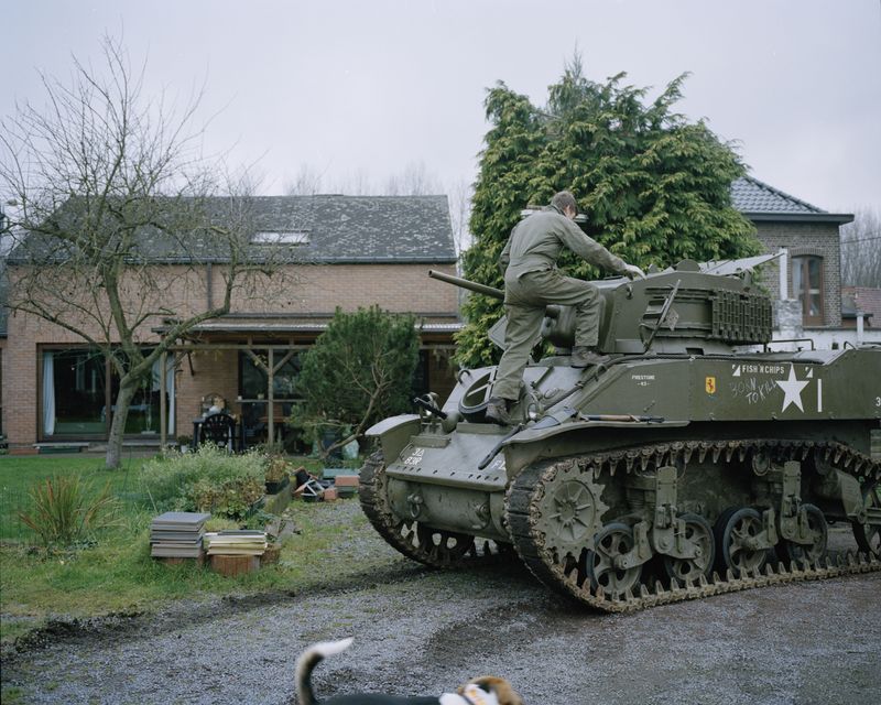© Giovanni Troilo - Mr Etienne and his son have a Second World War armored tank in their garden near Mons.