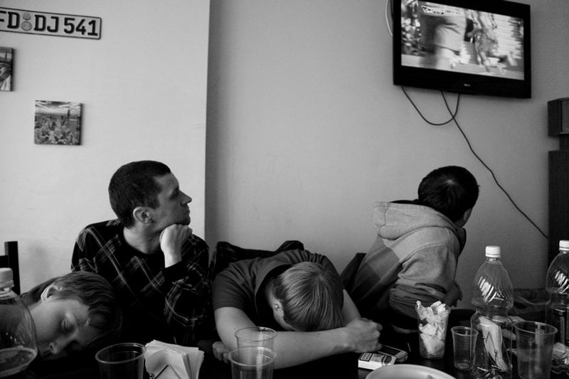 © Pavel Volkov - football fans did not get to the stadium and watching football on TV