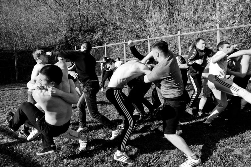 © Pavel Volkov - football hooligans fight opposing factions