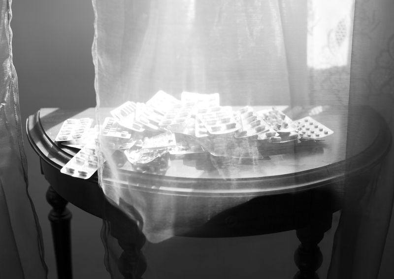 © paula roush - Still lifes of prescription pills found in drawers and bags, arranged under the sunlight in Lisbon apartment March 31 2018