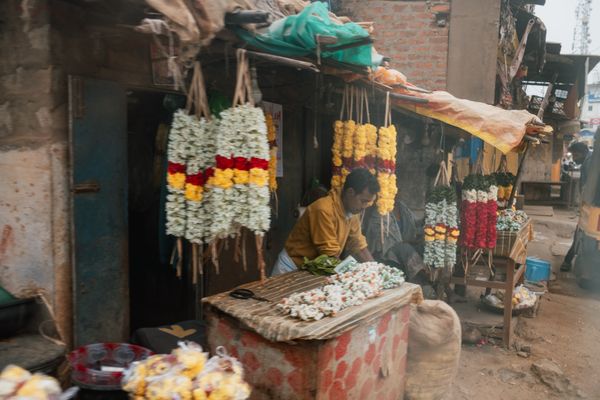 © Yvonne Chu - Garlands tied by hand; devotion, labor, and exchange braided into one gesture.