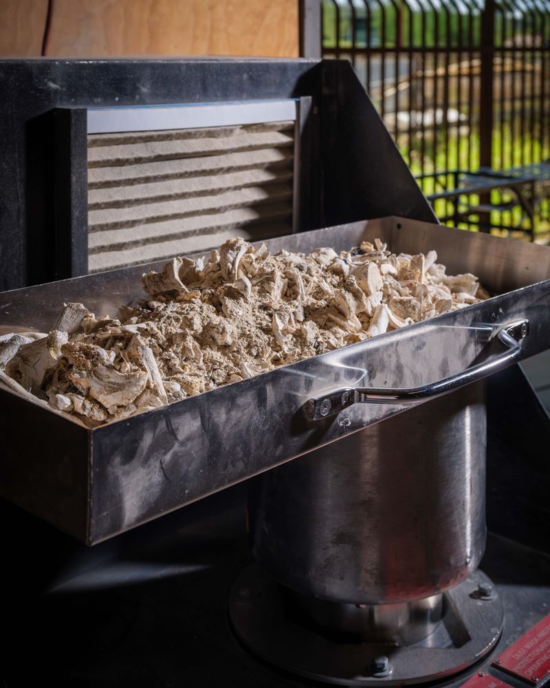 © Alastair Philip Wiper - Human remains that have been cremated are stored and packaged to hand over to relatives as ashes.