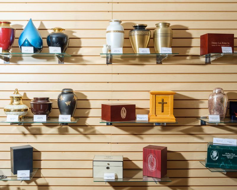 © Alastair Philip Wiper - A coice of urns on display at the funeral home.