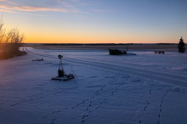© Bobbi Barbarich - A view of the sun rising over the frozen prairie. This is the last day before she has to go in for her bilateral mastectomy.