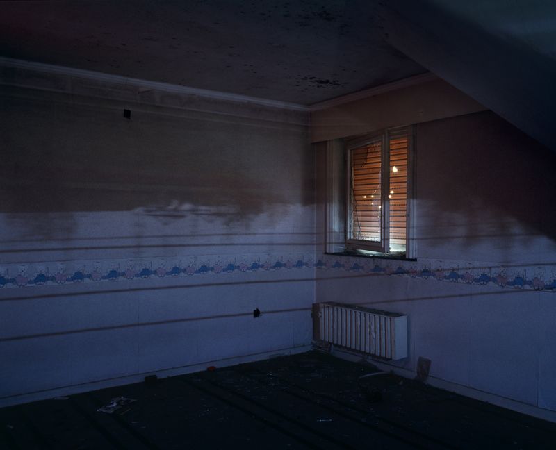 © Isabelle Pateer - 'camera obscura' in a bedroom of an abandoned house showing the shadows of the harbour cranes on the wall.