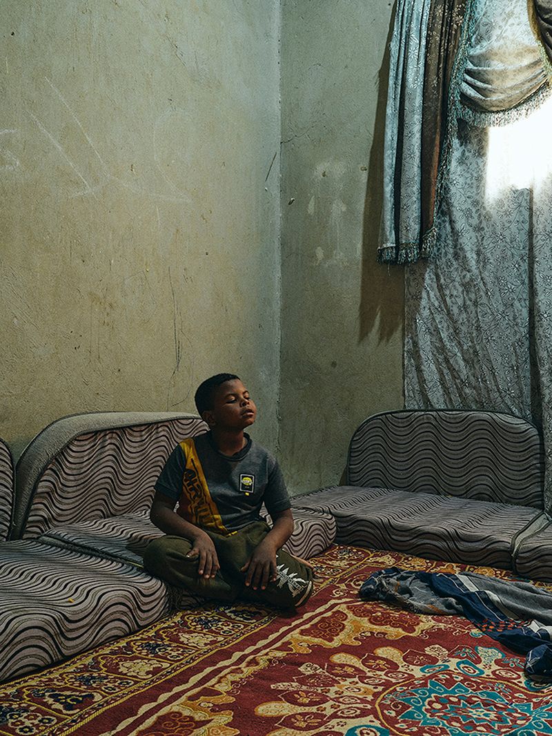 © Nathalie Mohadjer - Young boy in the livingroom