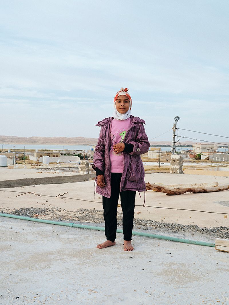 © Nathalie Mohadjer - Fatimas niece on her brothers rooftop.