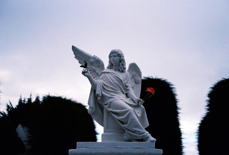 © Natalia - A hidden angel in the Cemetery of Punta Arenas, Chile.