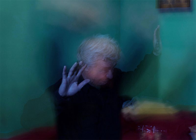 © Denis Serrano - Edmundo reacts to the music coming from two radios.