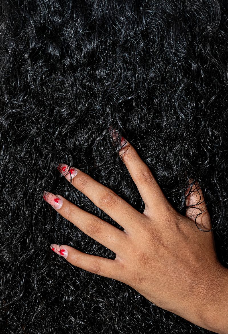 © Tania Barrientos - The hair of a young afro-descendant woman in the town of San Marquitos, Oaxaca