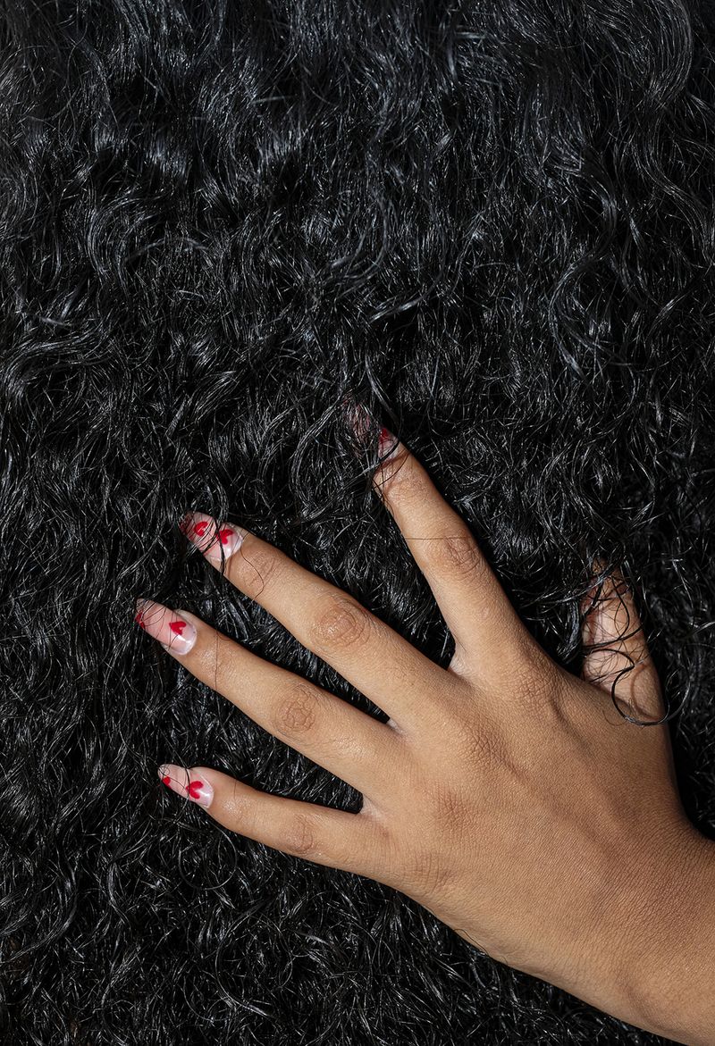 © Tania Barrientos - The hair of a young afro-descendant woman in the town of San Marquitos, Oaxaca