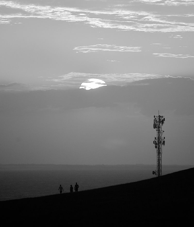 © Sergio Fadul - 16.	Connected Horizon — Ceará, 2026(Sunset with cell antenna — Jericoacoara)
