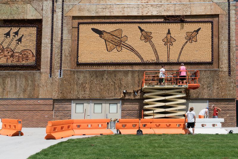 © Epiphany Knedler - Rehusking the World's Only Corn Palace