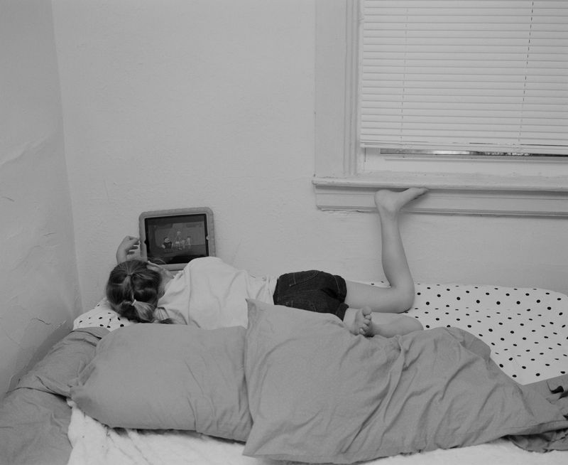 © Matt Eich - Maddie on iPad, Richmond, Virginia. 2016.