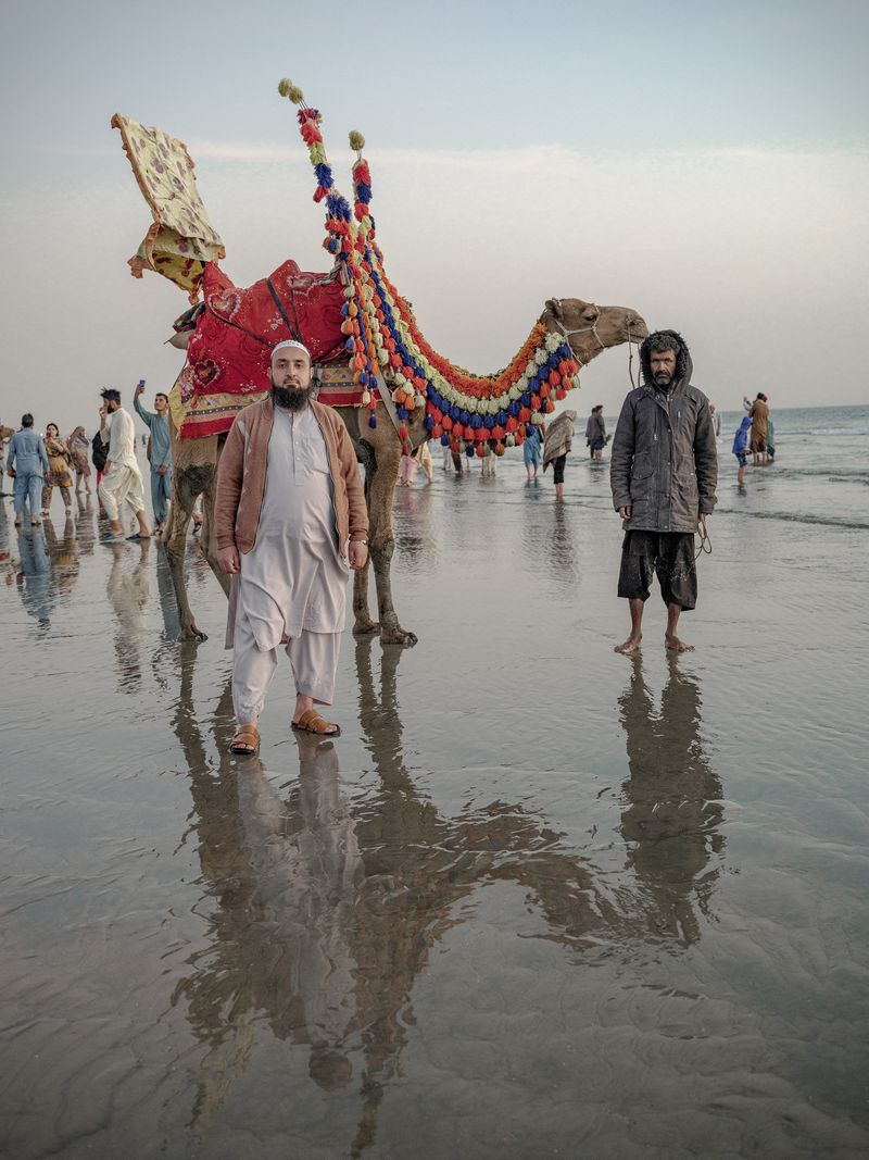 © Jo Ann Walters - vendor, camel + customer, untitled from series The Arabian Sea:Until Their Bodies Glowed, 2023