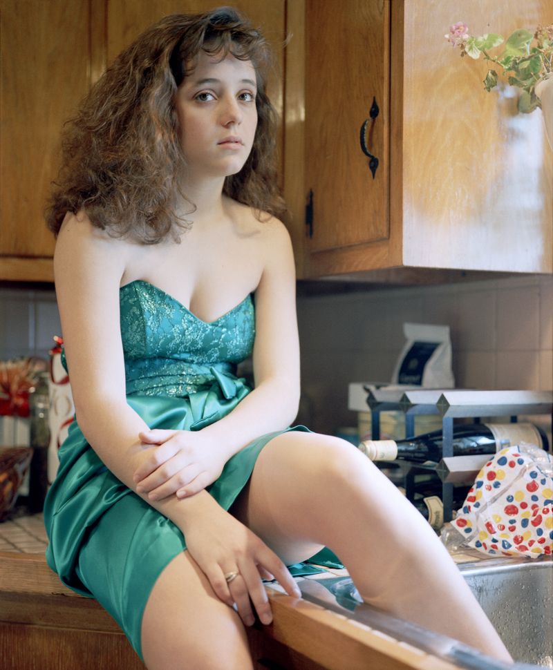 © Jo Ann Walters - 04_Jessica in green prom dress in kitchen, from the series Vanity + Consolation, 1988-present